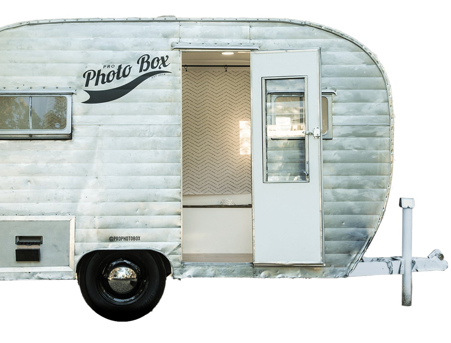grey and silver camper van turned into photo booth trailer